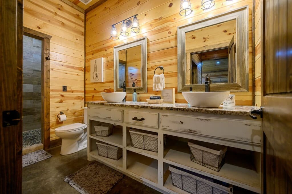 Unwind after a day of adventure in our stylish washroom, where every detail adds to your cabin retreat