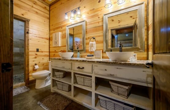 Unwind after a day of adventure in our stylish washroom, where every detail adds to your cabin retreat