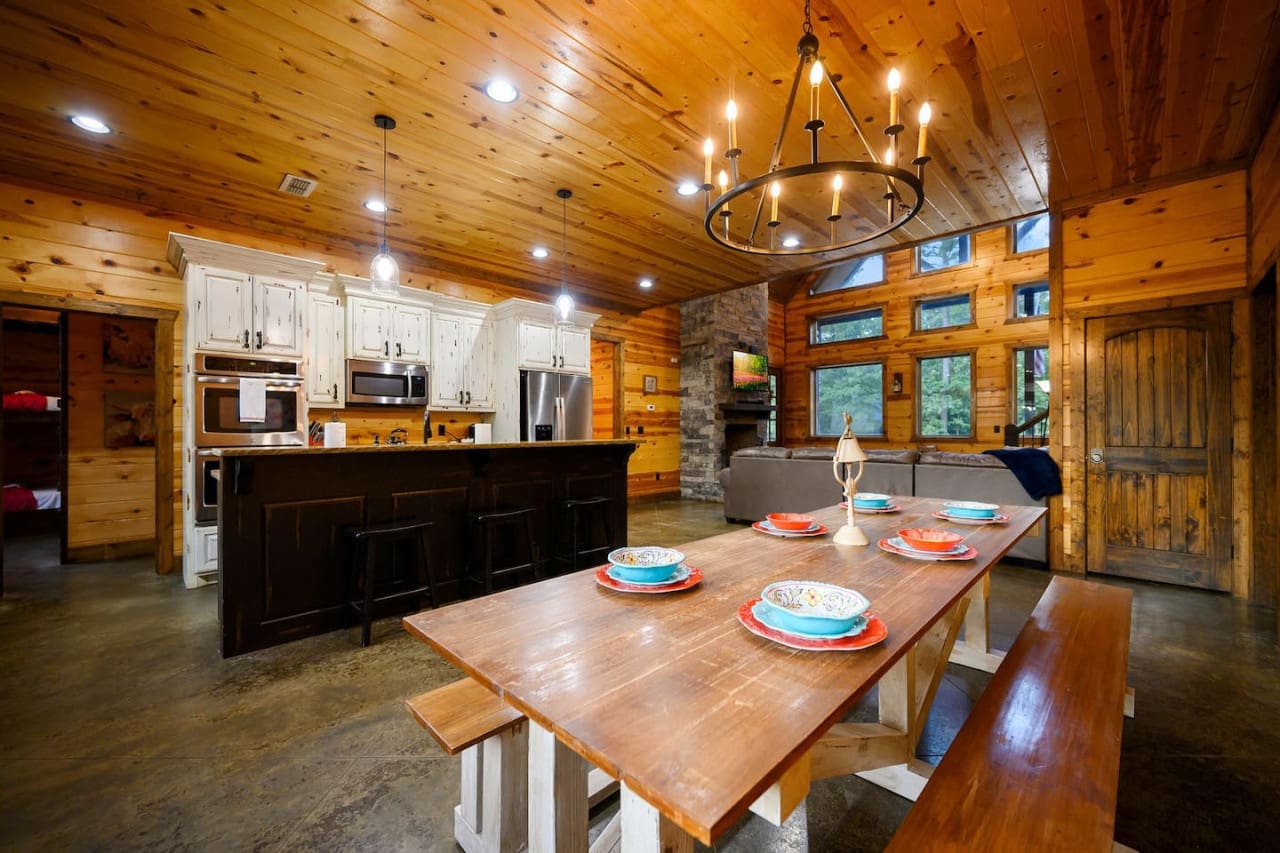 Create delicious memories and share laughter at our dining table, the heart of your cozy cabin gatherings.