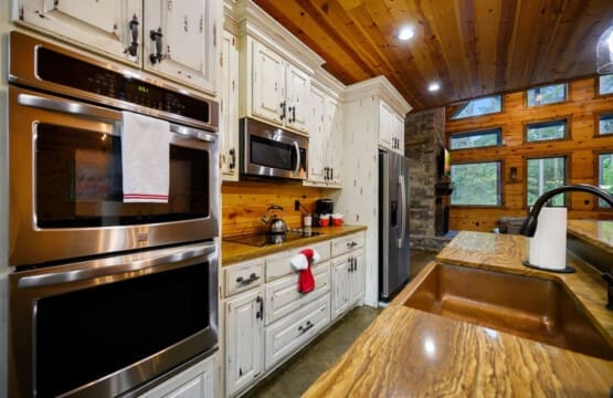 Whip up delicious meals and warm treats with ease—our cabin’s kitchen oven is your culinary companion.