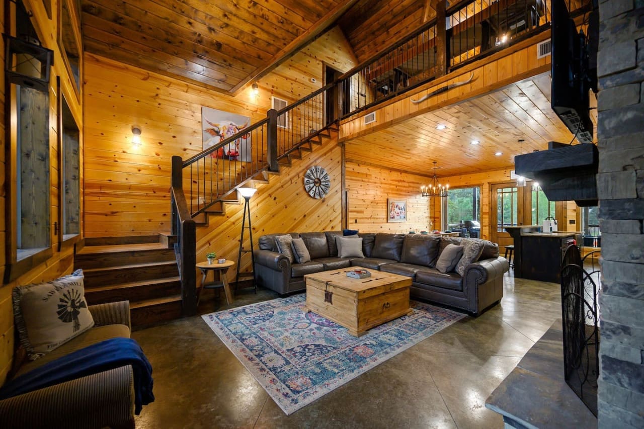 Step up to new heights of comfort and style—our cabin’s stairs lead to relaxation and adventure.