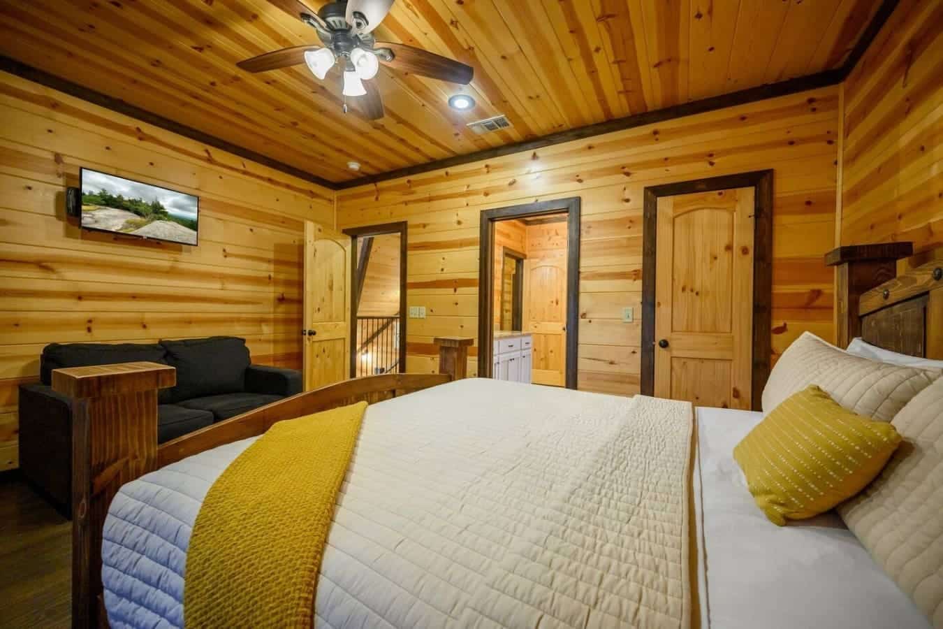 This master suite basically gives you your own little retreat within the retreat—a king bed that's begging for lazy mornings, a fireplace for those cooler nights, and a seating area where you can actually relax without leaving the room.