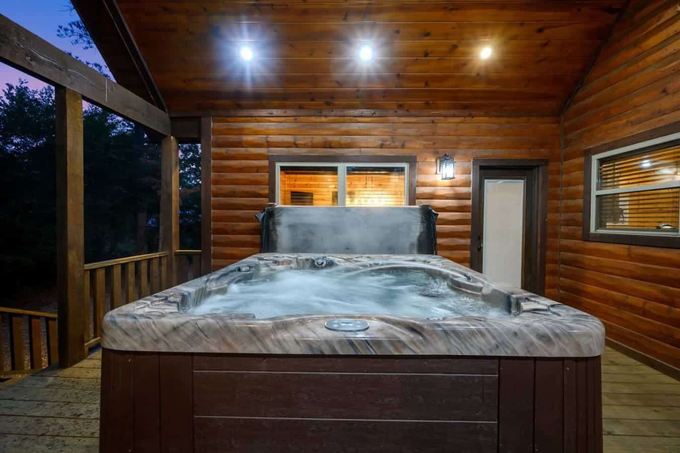 Nothing beats soaking in a hot tub on your own private deck while the cabin's warm glow spills out behind you and the Oklahoma woods settle in for the night.