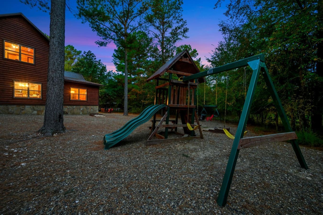 The playground setup right here in the backyard means the kids can burn off energy while you kick back on the porch watching the sunset paint the sky—no driving anywhere required.