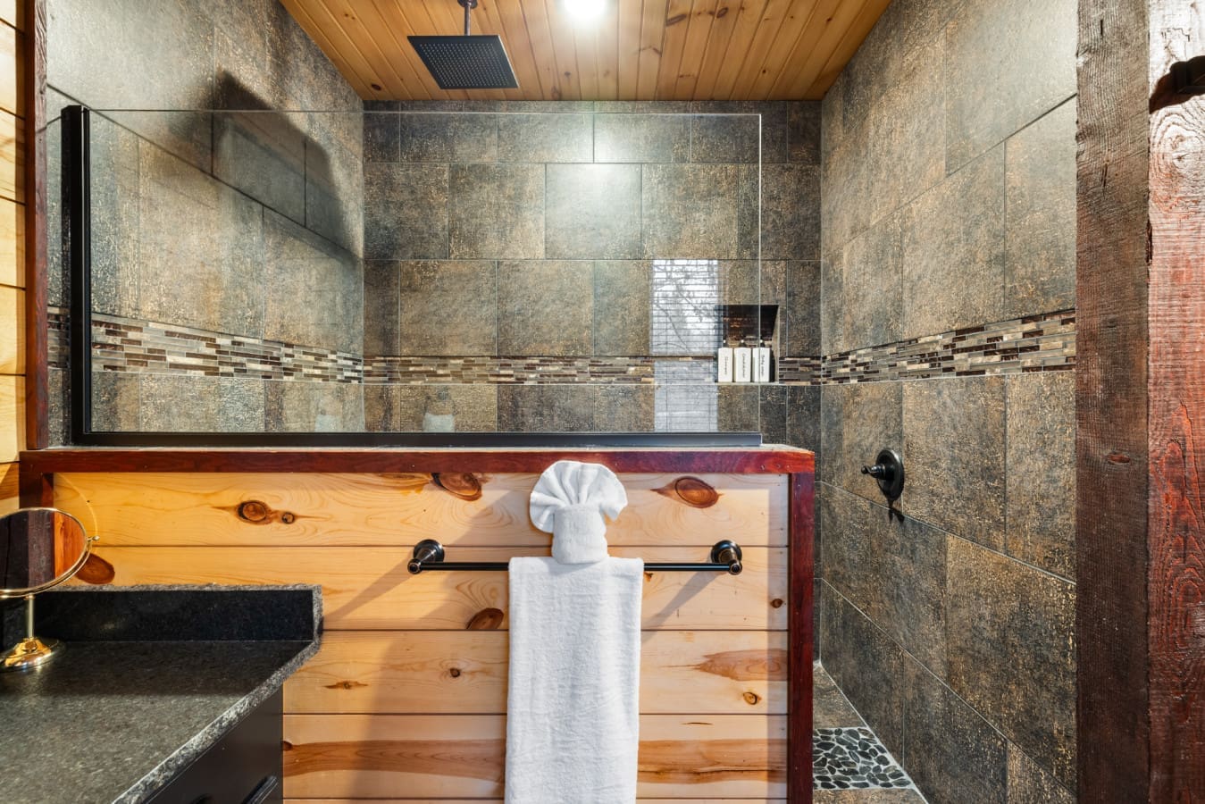 The overall design blends rustic charm with luxury elements.