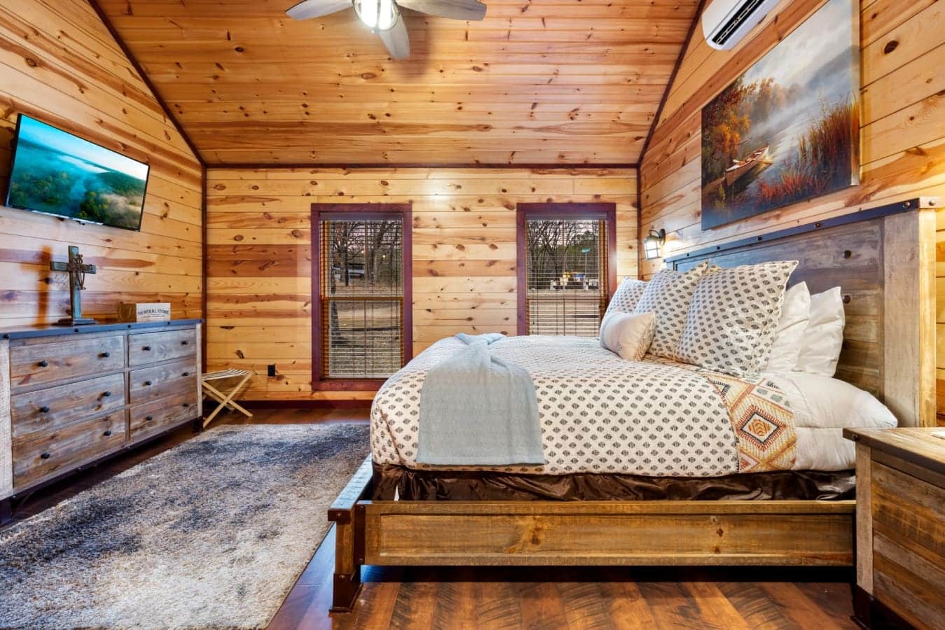 The cabin is designed as a romantic retreat with modern comforts and rustic charm.