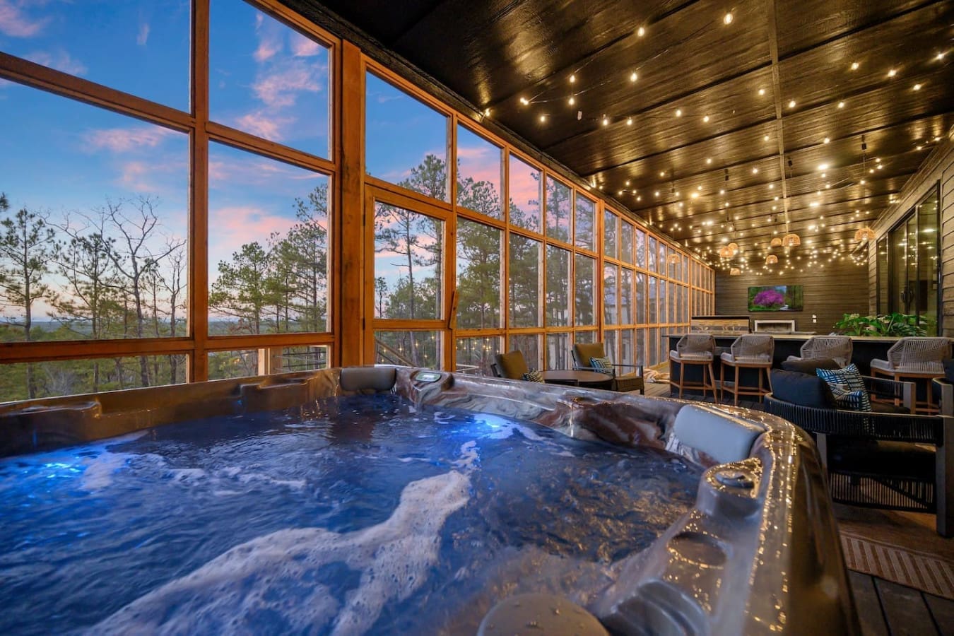 Soak in this indoor hot tub while taking in those mountain views through the floor-to-ceiling windows—basically the dream setup for unwinding after a day outdoors.