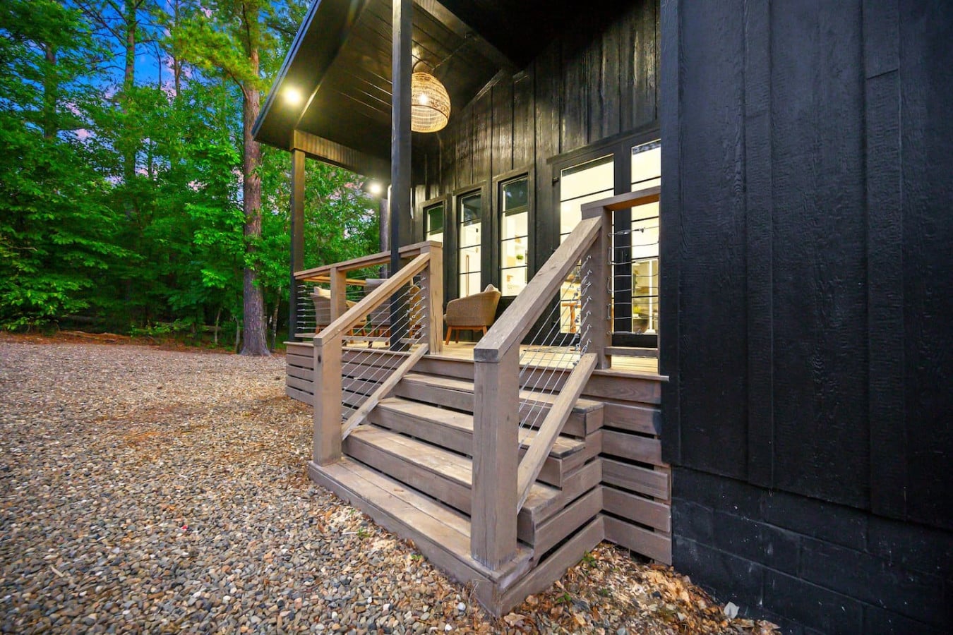 Step into serenityu2014where sleek lines meet cozy comforts in the heart of nature.
