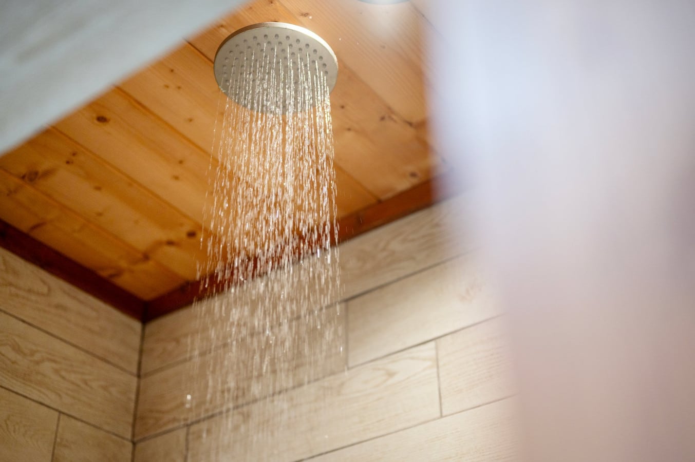 Refresh and rejuvenate under the sleek, modern shower head.