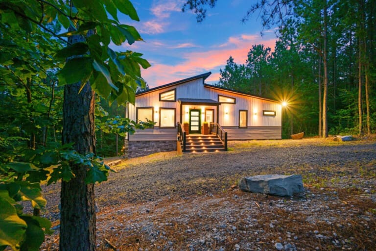 This cozy forest hideaway comes alive as the sun dips down, giving you that perfect vibe for actually unplugging and breathing for a few days.