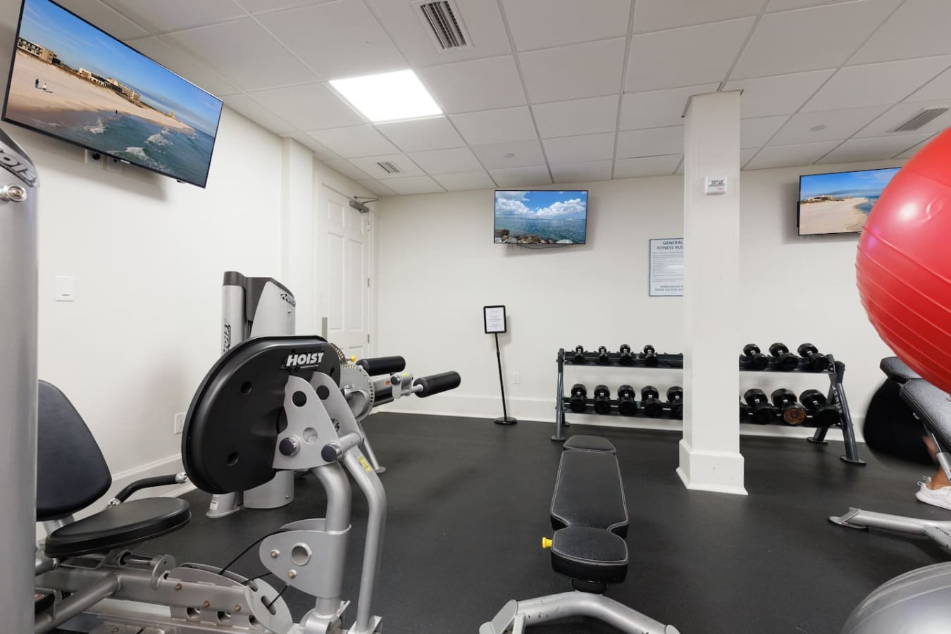 Get your sweat on with a full gym setup, then step outside to shake off the sand and dive back into beach mode.