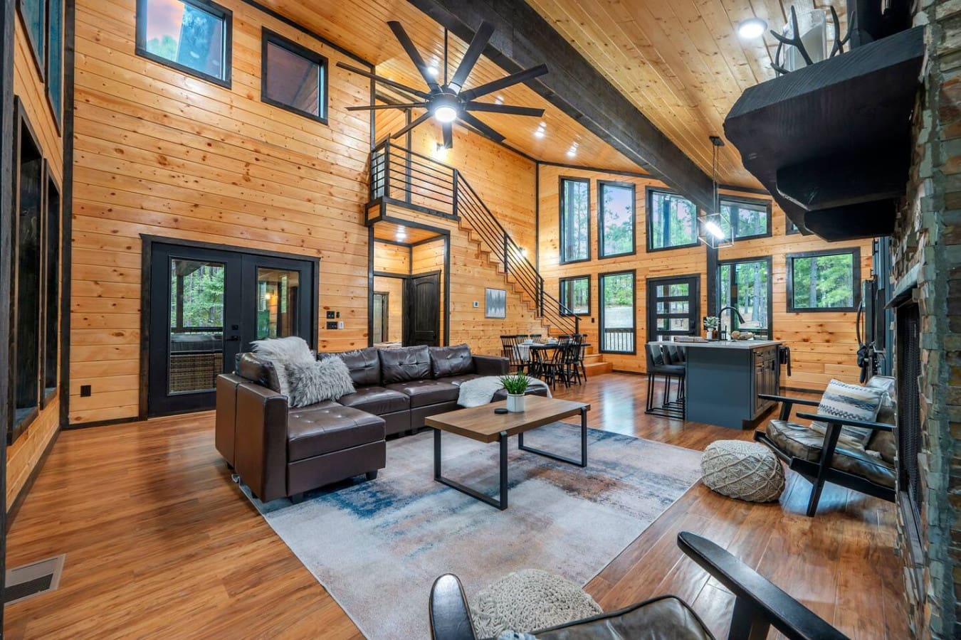 Modern comfort, woodland backdrop.