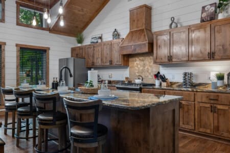 Our kitchen counter seating offers the perfect perch for casual chats and culinary adventures.