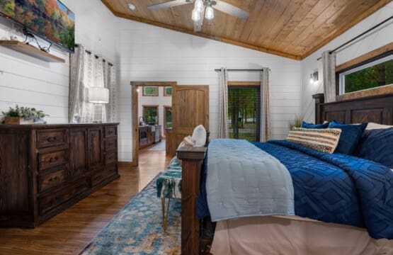 Our cozy cabin bedroom, where every corner whispers of comfort and charm.