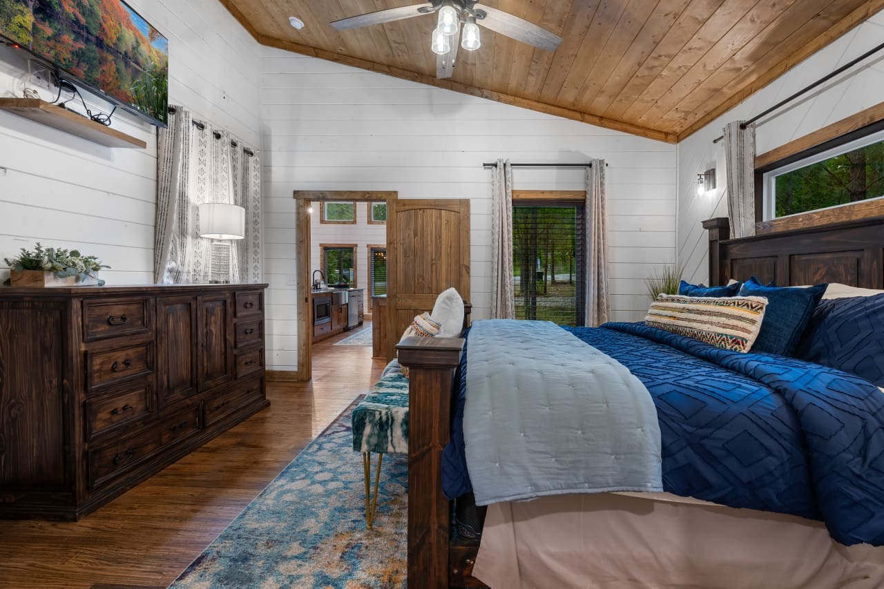 Our cozy cabin bedroom, where every corner whispers of comfort and charm.