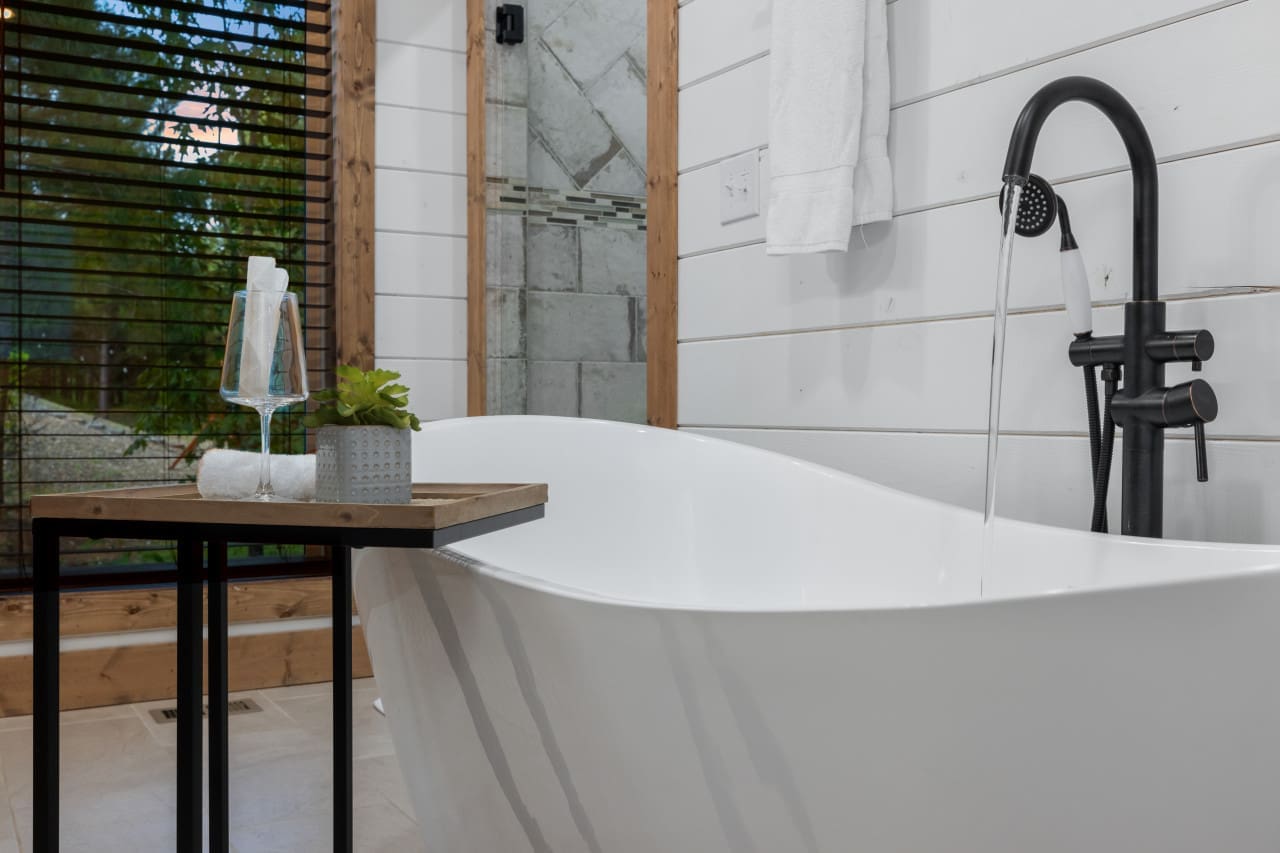 Unwind with a glass of wine and a luxurious soak! 🍷💧