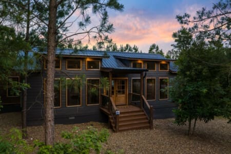 Step into nature's embrace with the stunning outside view from our cabin