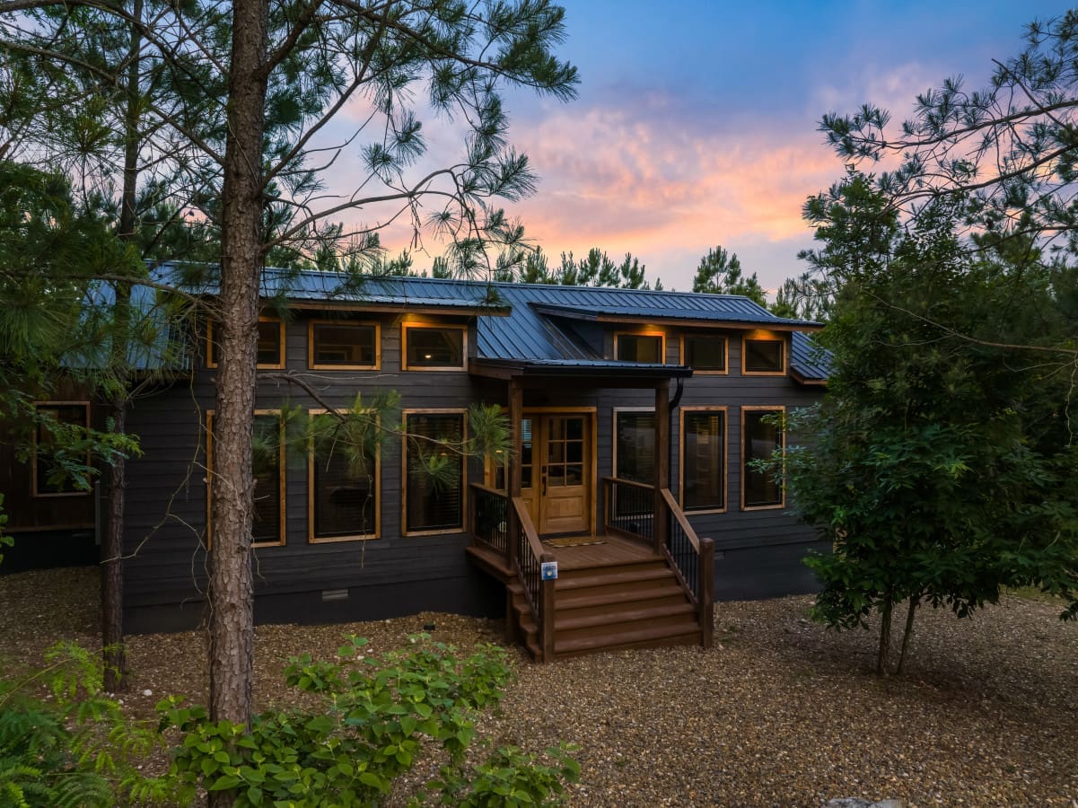 Step into nature's embrace with the stunning outside view from our cabin