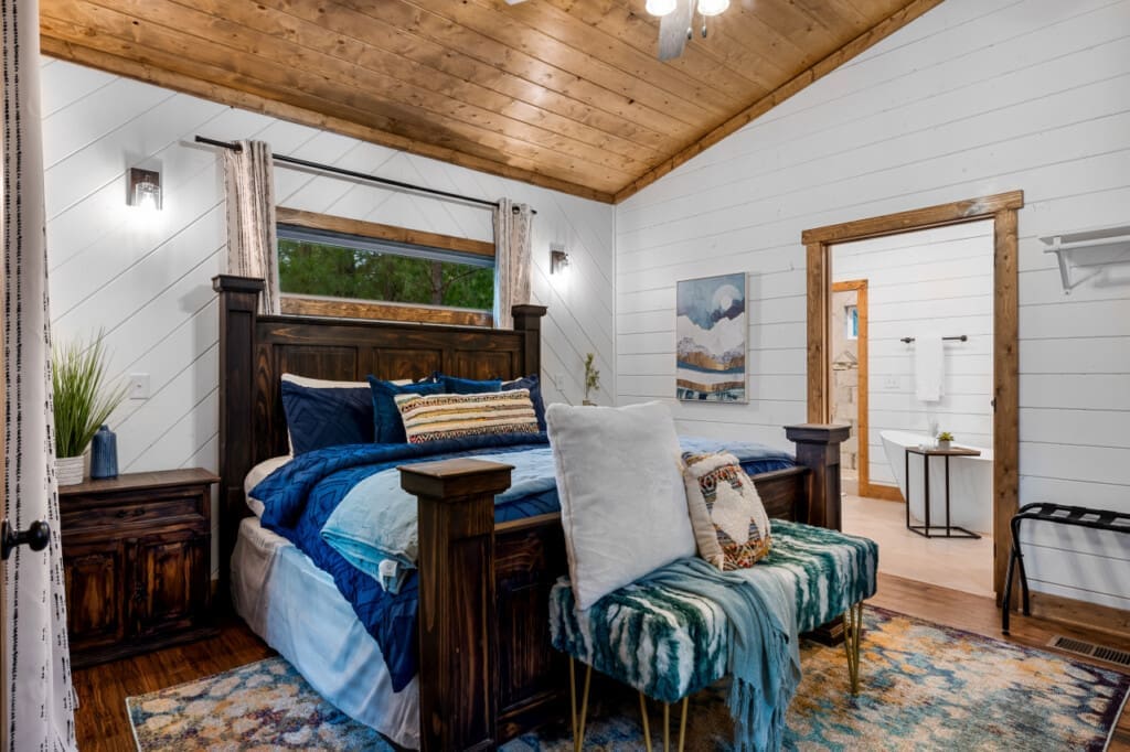 Find peace and tranquility in the comfort of our cabin's bedroom.