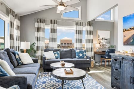 Modern comfort meets coastal charm in this bright, airy living space.
