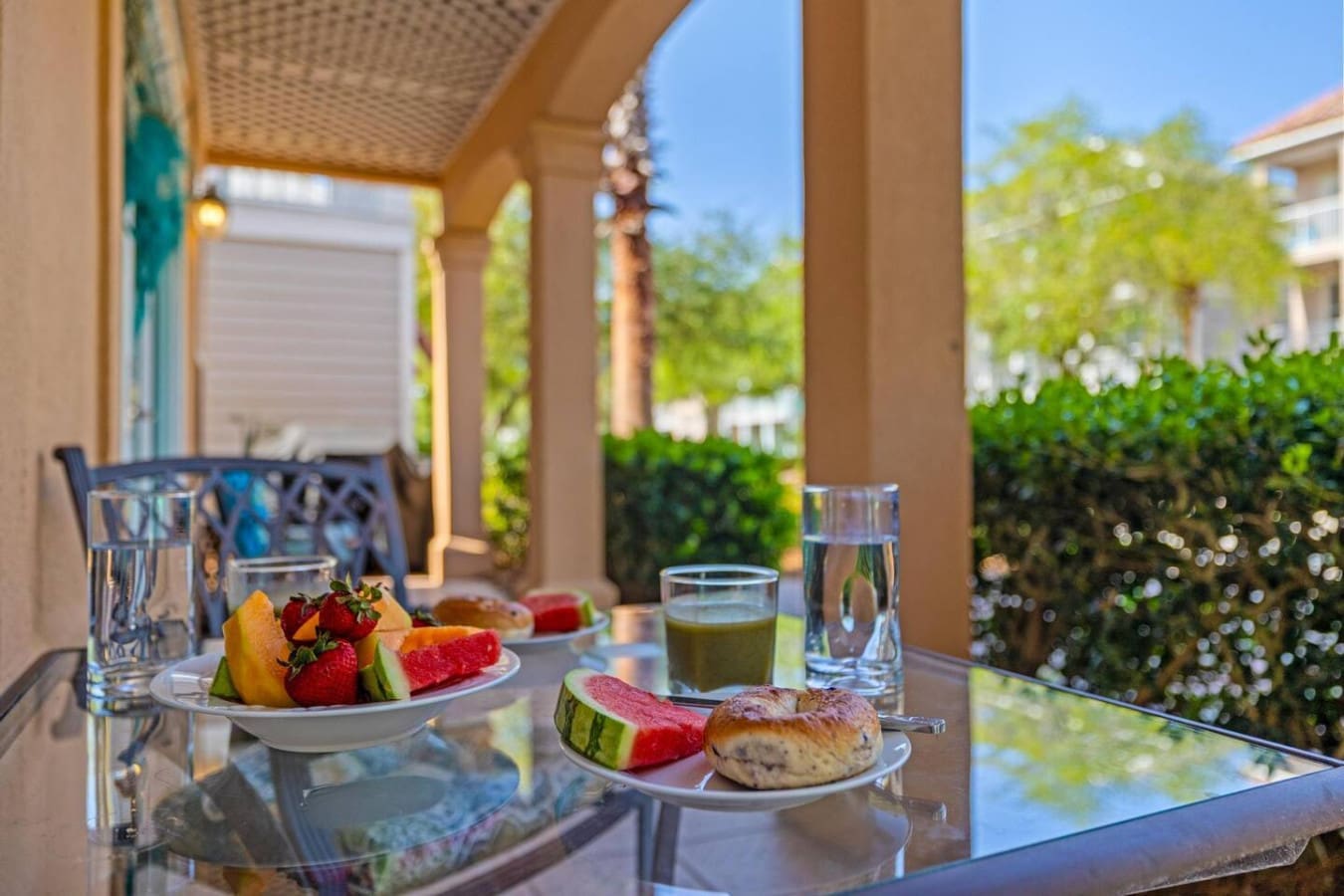 Your own private covered patio with views of the tropical grounds and that refreshing breeze—basically the perfect spot to start your day before heading out to explore.