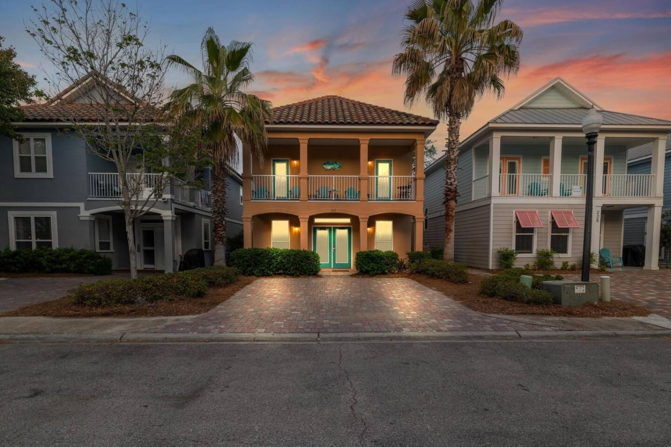 Picture this: you're sipping your morning coffee on the porch of this peachy-keen beachside gem, palm trees swaying, and you realize you've officially made the best decision of your life.
