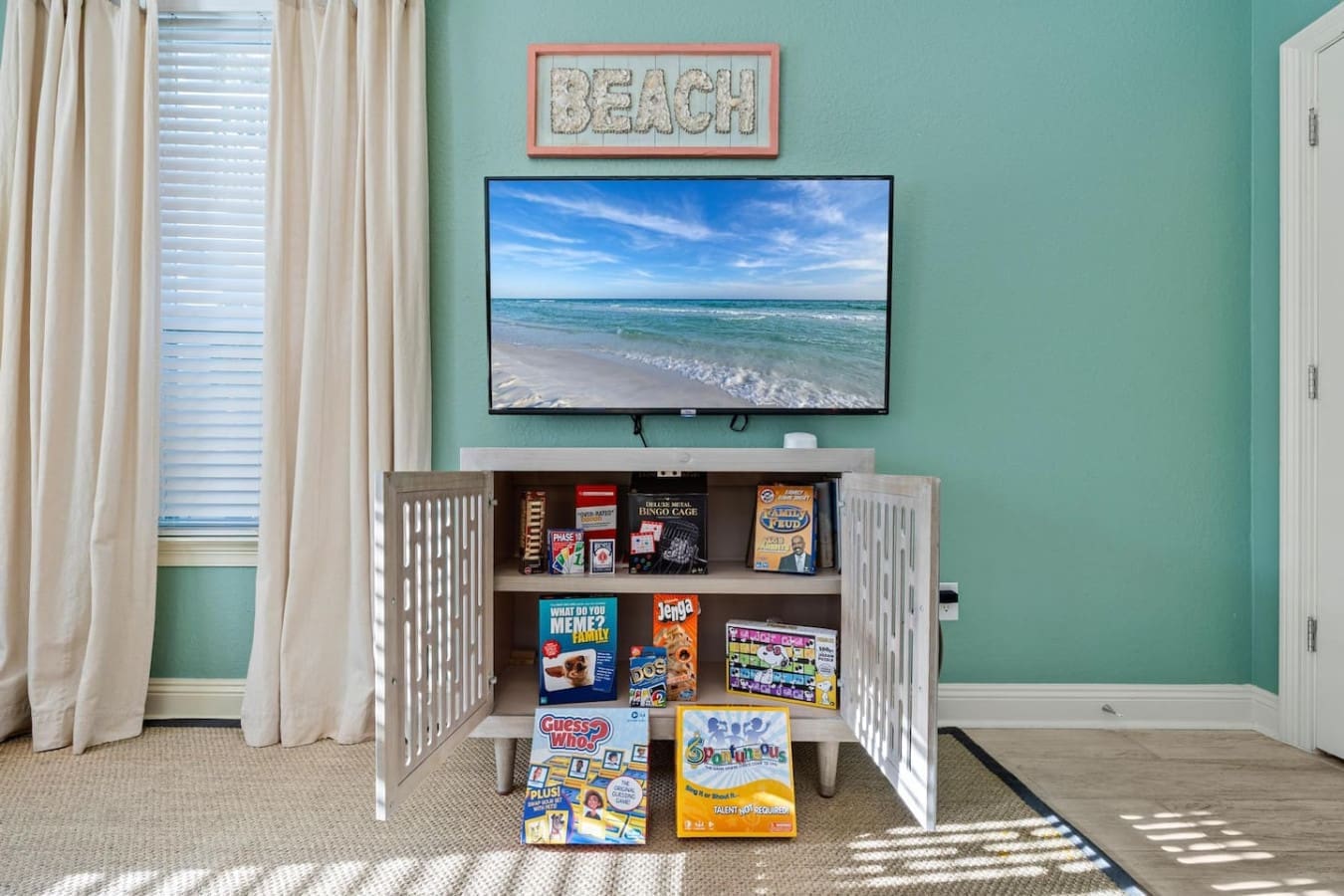Your entertainment center is stocked and ready to go, with the beach right there on the screen and board games galore to keep the whole crew happy when you need a break from the sand.