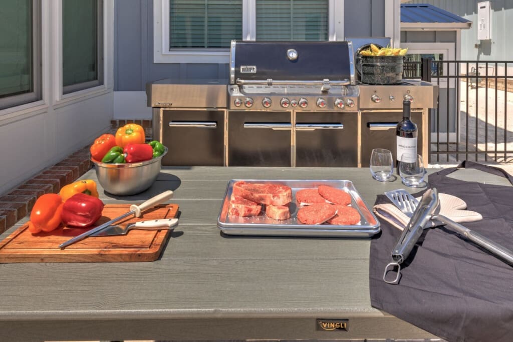 This outdoor kitchen setup is basically begging you to invite friends over and grill until sunset.