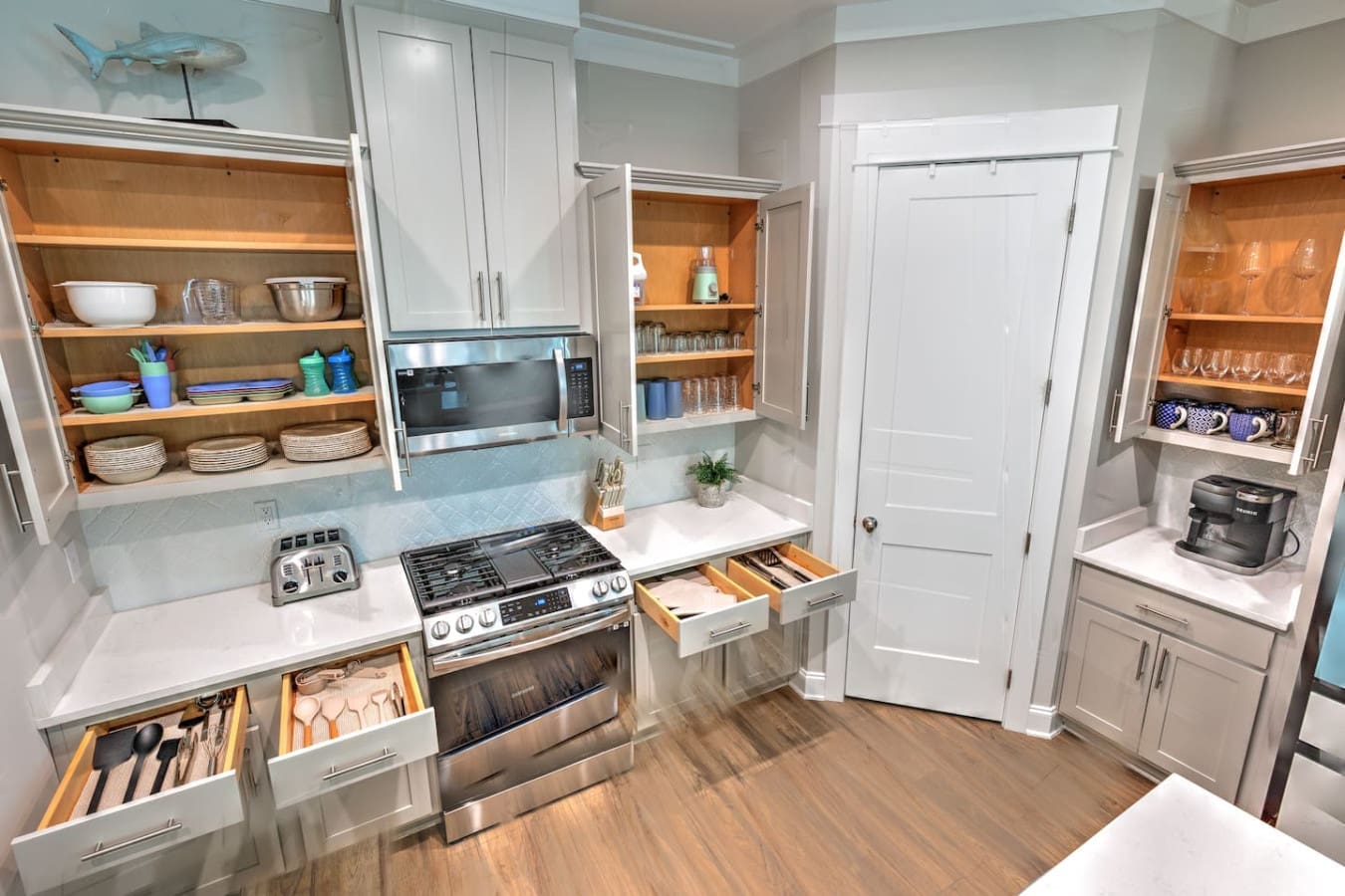 This kitchen is basically a chef's dream with all those smart storage solutions and that gorgeous gas range ready for you to actually cook something amazing during your stay.