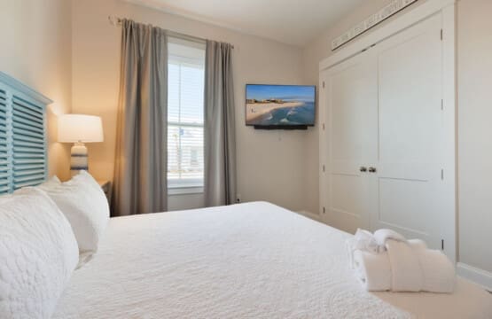 Wake up to those coastal vibes and ocean views—this bedroom is basically the definition of a peaceful beach escape without leaving your bed.
