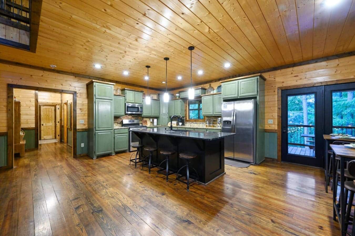 This kitchen is basically the hub where everyone ends up anyway, with enough counter space and bar seating that you can actually cook and hang out at the same time without tripping over each other.