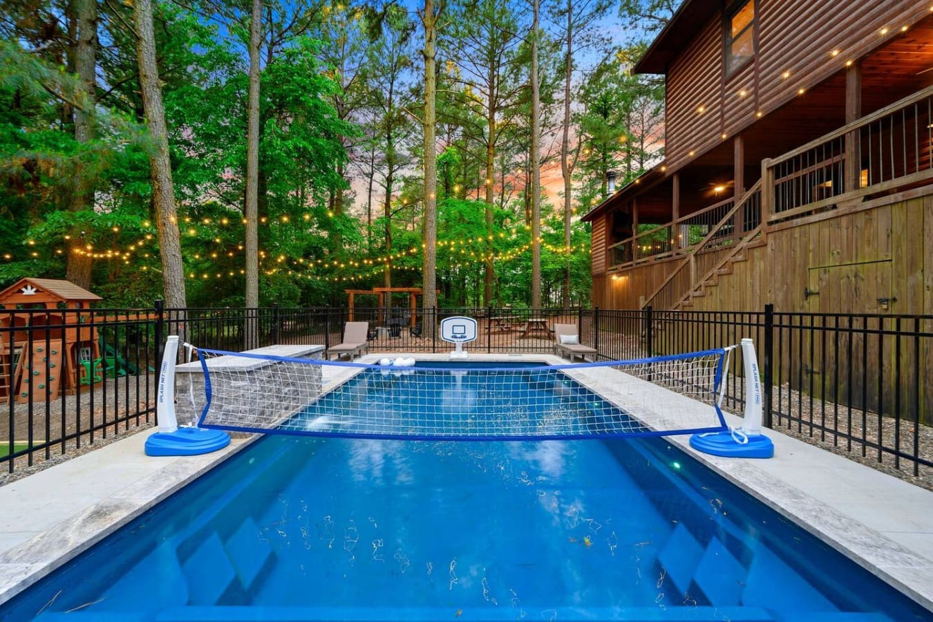 This pool's basically begging you to do a cannonball, especially once the sun goes down and those string lights kick in.