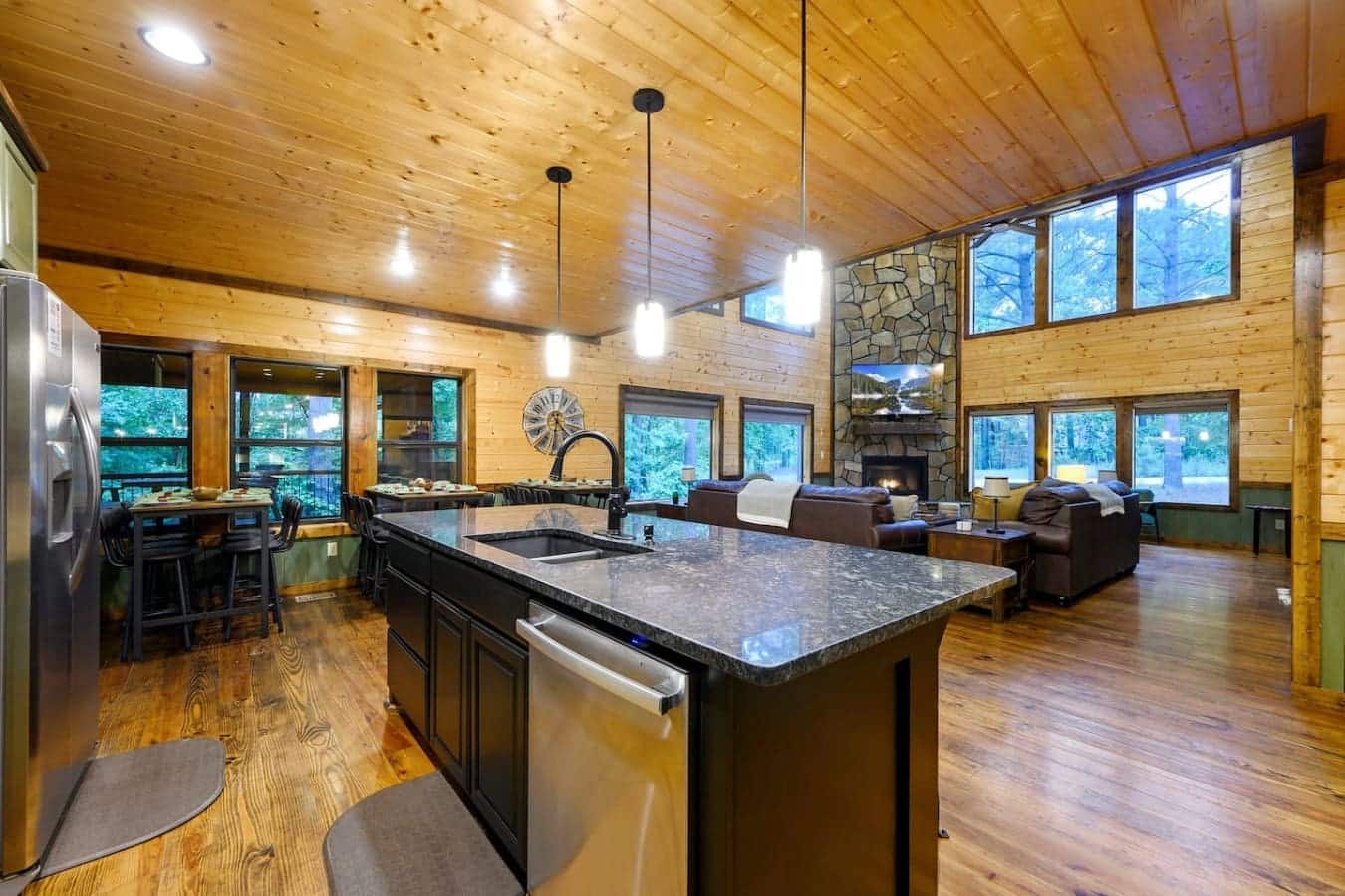 This open kitchen island is basically the command center where you can cook, chat with everyone hanging out in the living room, and keep the whole vibe going without missing a second of what's happening.