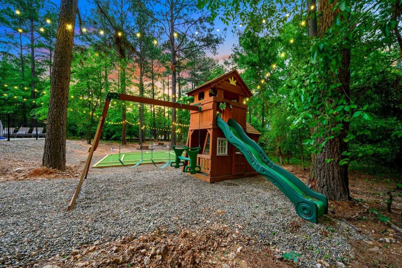 If your kids have been bouncing off the walls, this treehouse-style playground with the slide, swings, and climbing setup will wear them out in the best way possible.
