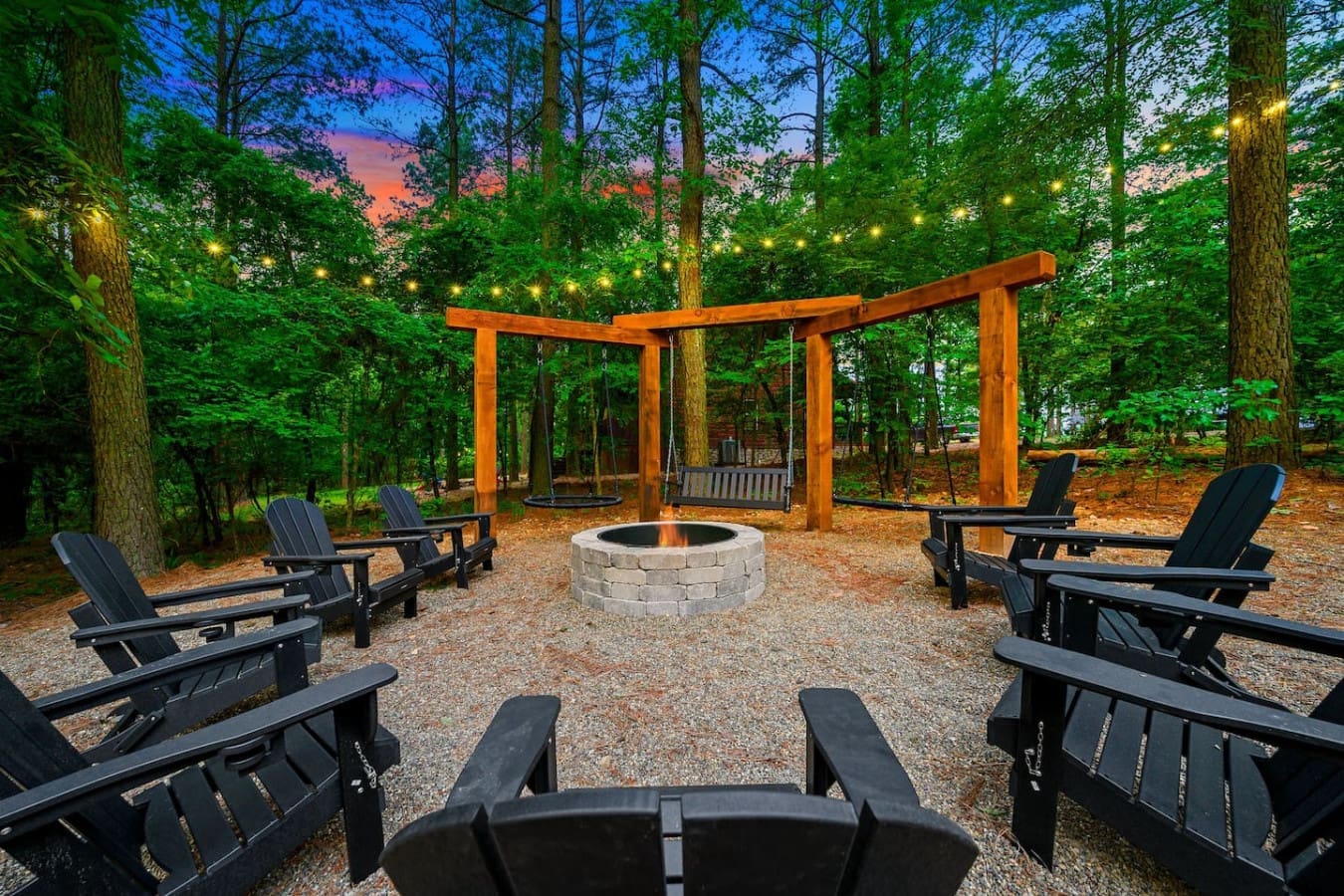 Gather around the fire pit under those string lights and you've got the whole vibe—whether you're roasting marshmallows or just watching the sunset with a drink in hand.
