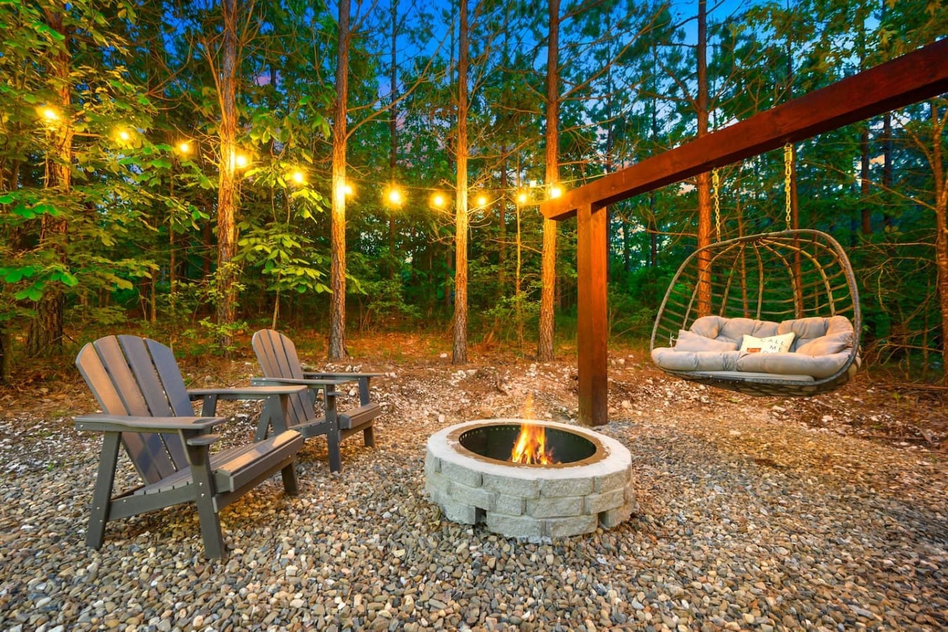Tucked beneath towering pines, this cabin blends beautifully into its natural surroundings.