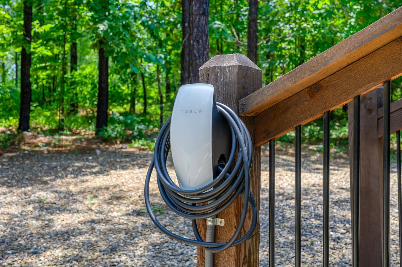Convenient Tesla outlet makes charging easy during your rustic escape.