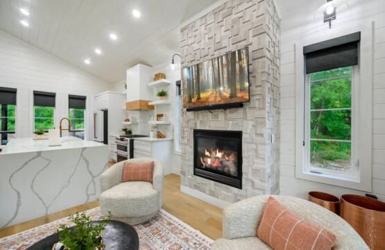 Where crackling fires and modern design come together—kick back, relax, and stay awhile.