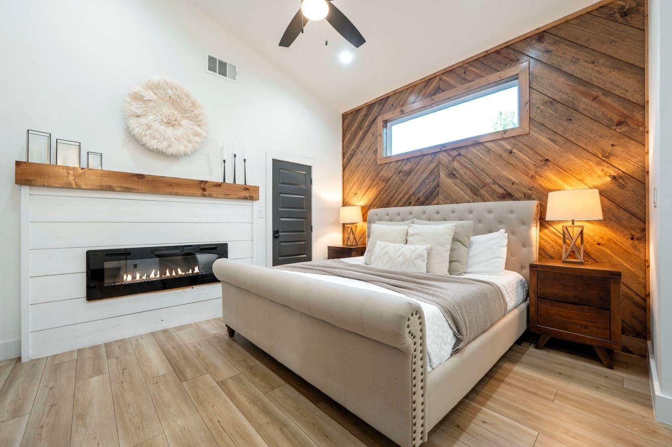 This bedroom is your personal retreat wrapped in warmth and style
