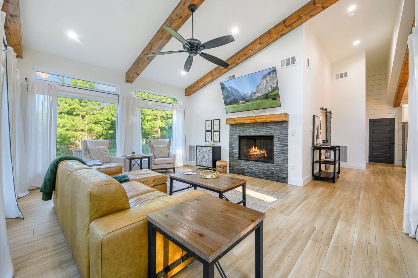 Curl up by the fire with forest views all around.