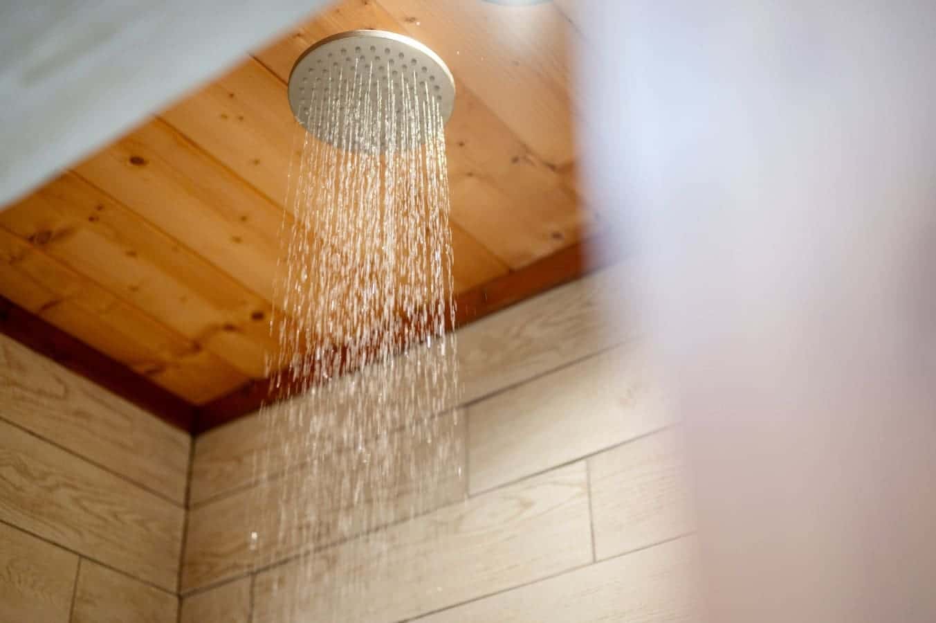 Refresh and rejuvenate under the sleek, modern shower head.