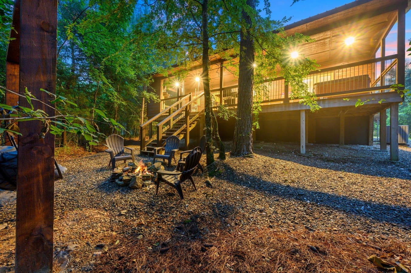Rustic wood finishes give this cabin a warm, inviting curb appeal.