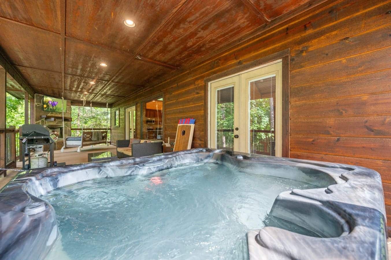 Kick back under the stars—this cozy hot tub is ready whenever you are.