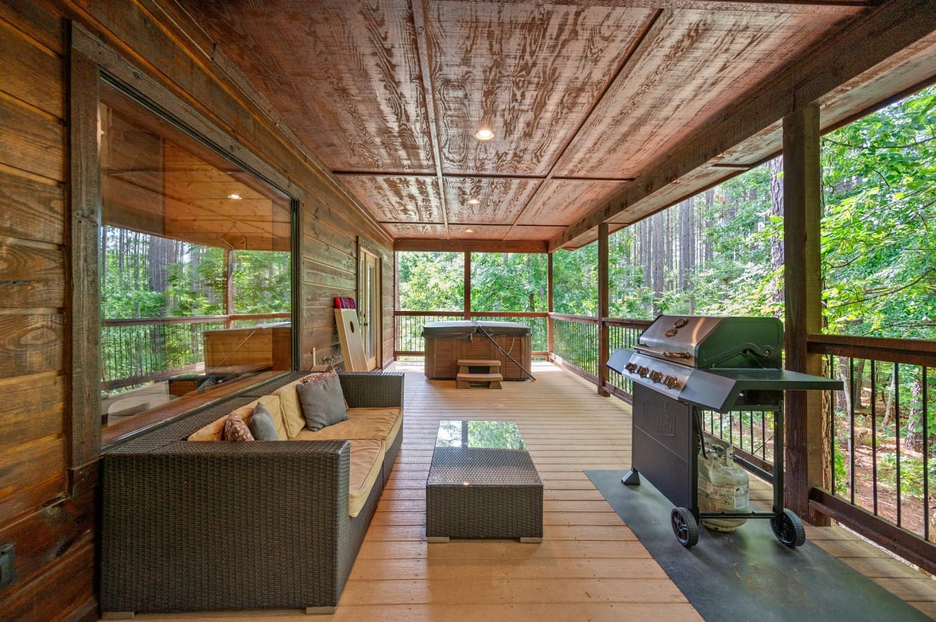Fire up the grill and relax in the comfy chairs—this patio is made for gatherings.