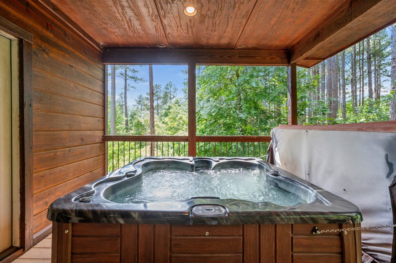 Private hot tub tucked under the trees—pure outdoor bliss.