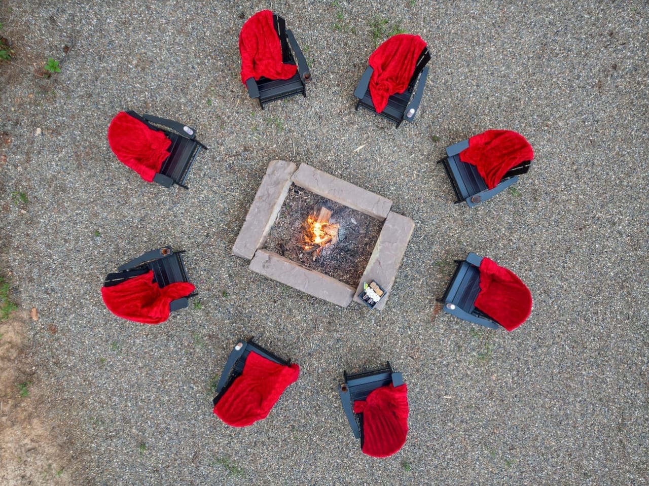 Cozy fire pit circle ready for stories, s'mores, and starry nights.