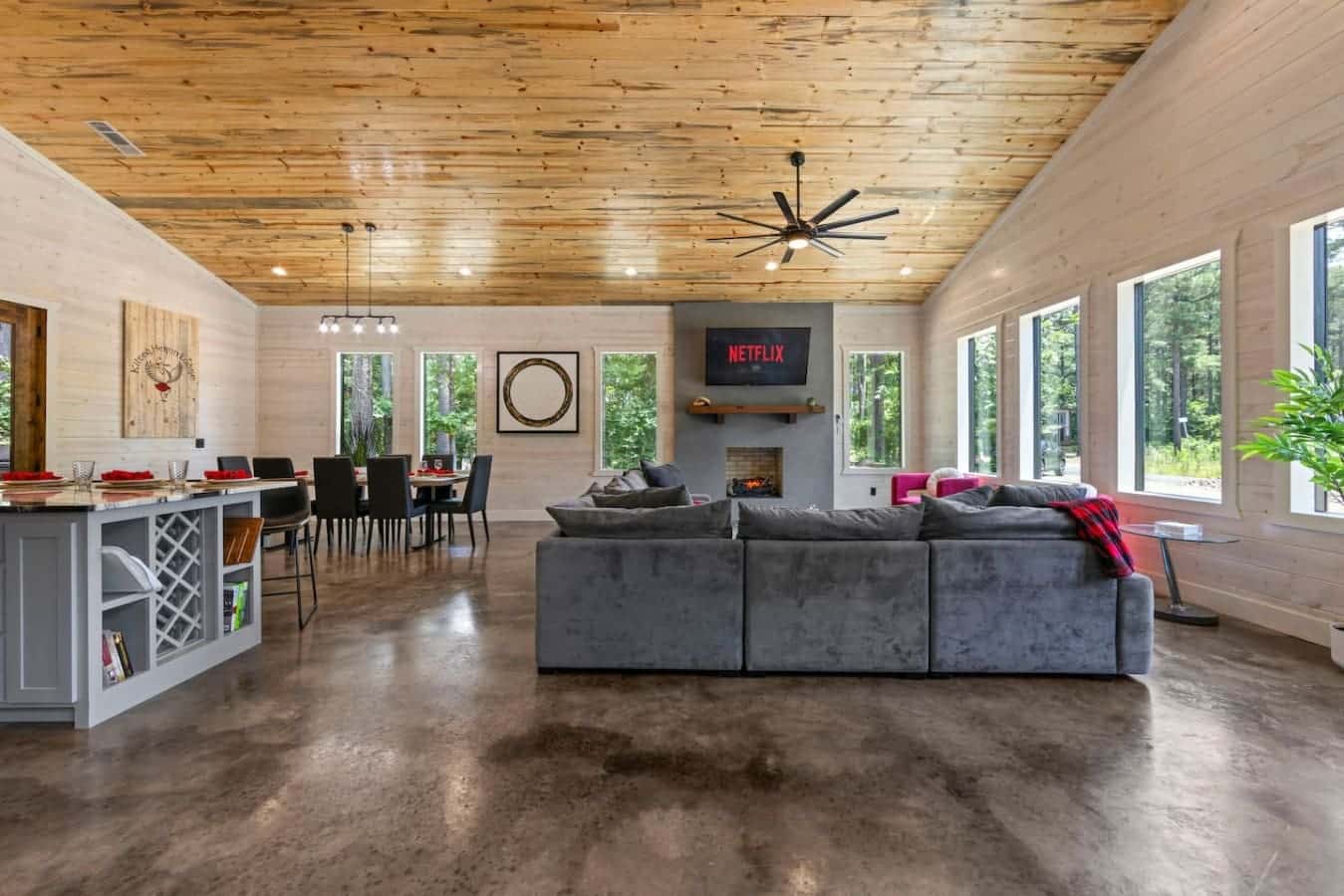 Cook. Dine. Unwind. 🍽️🛋️🔥 Whether you're whipping up a meal, hosting game night, or binge-watching by the fireplace, this open-concept living space has room for it all