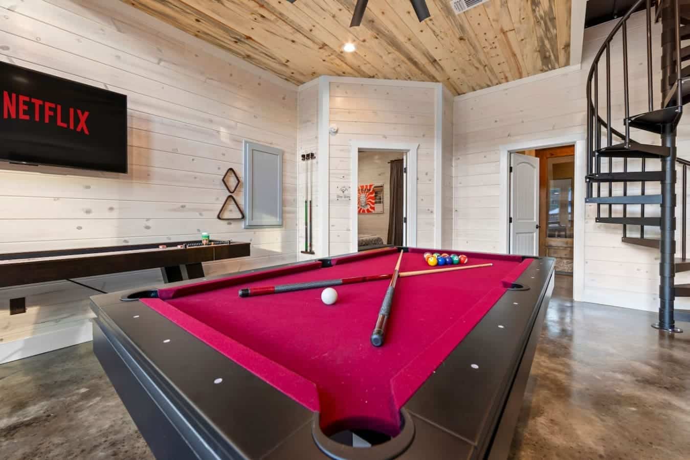 Rain or shine, the game’s always on — pool, shuffleboard, and Netflix vibes