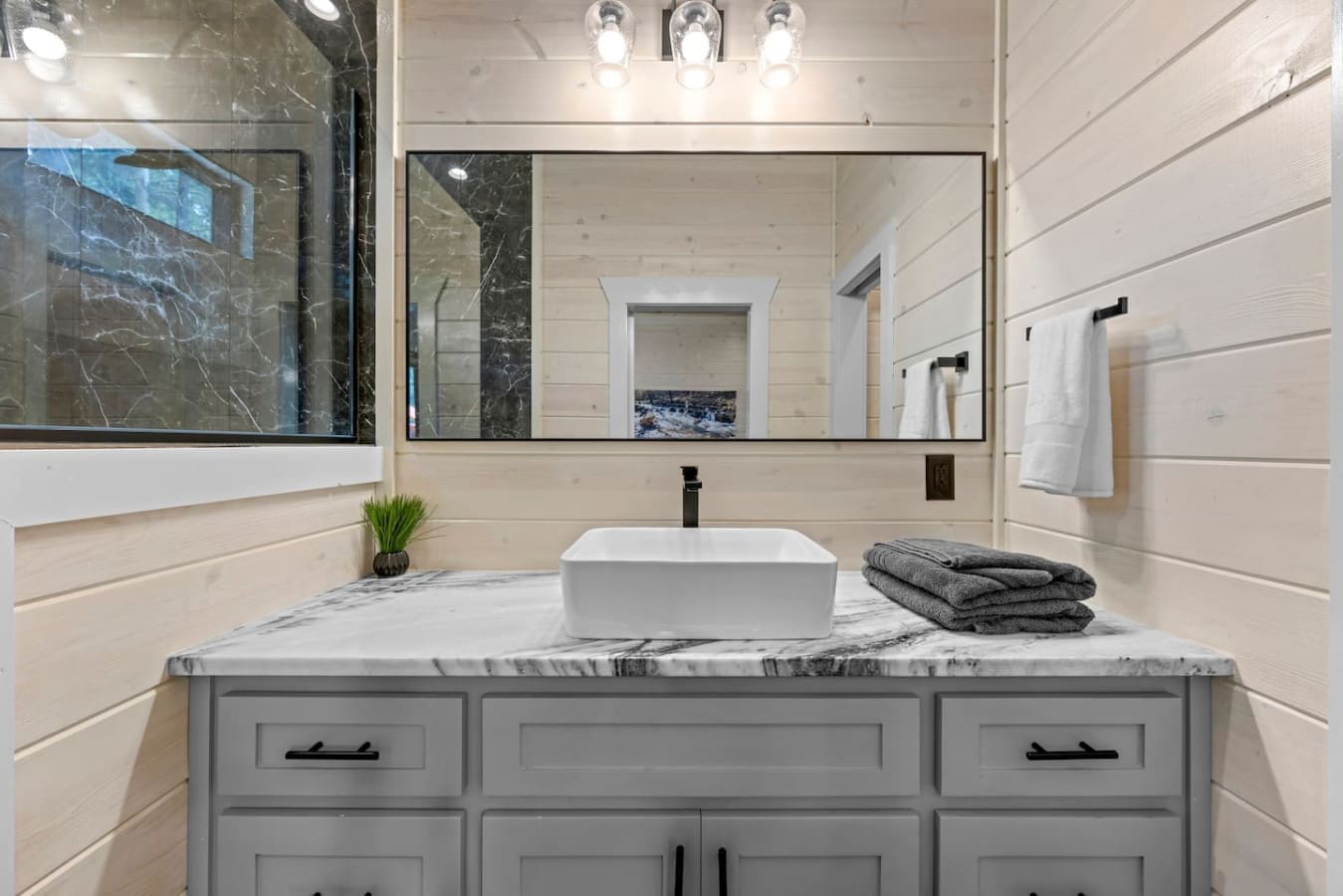 Clean lines, cool marble, and cozy vibes. Your serene start begins right here.