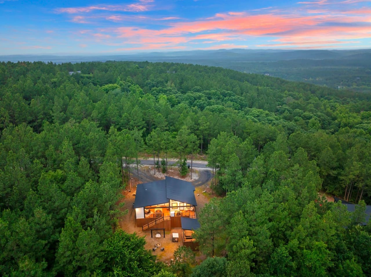 This cozy hideaway feels like you've borrowed a cabin from the future and dropped it right into the middle of the woods.